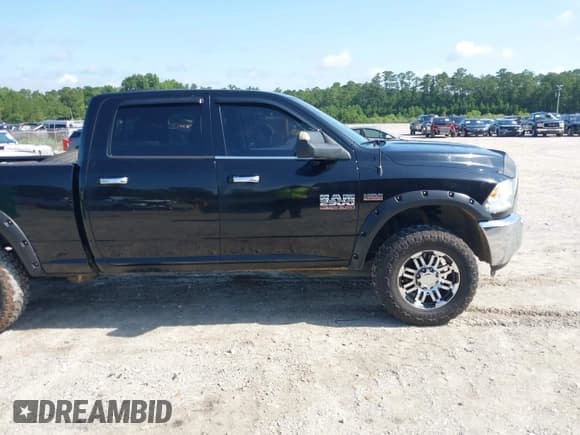 ✅ 2014 Ram 2500 SLT • VIN: 3C6TR5DT4EG217792 • Lot: 42489013. Listed on IAAI with 190,773 mi. Free auction sales archive from the USA and detailed vehicle history report at DreamBid. Image 13.