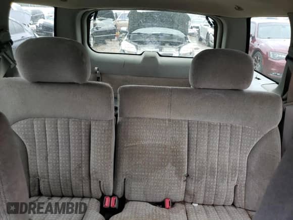 1999 Chevrolet Blazer LS z VIN 1GNDT13W9X2166733, wystawiony jako Copart lot #64965434 z przebiegiem 214 296 mil mil oraz Nie do naprawy • Non repairable. Historia ofert i sprzedaży dostępna na DreamBid. Obrazek 10.