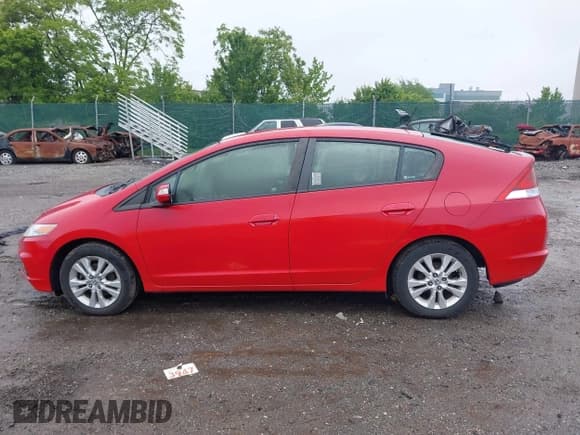 ✅ 2012 Honda Insight EX • VIN: JHMZE2H78CS001541 • Лот: 42369924. Опубликован ранее на IAAI с пробегом Не указан. Бесплатный доступ к архиву аукционных продаж из США и подробный отчёт об истории автомобиля на DreamBid. Изображение 13.