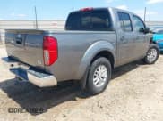 ✅ 2021 Nissan Frontier SV • VIN: 1N6ED0EA0MN710260 • Lot: 42292937. Listed on IAAI with 63,573 mi. Free auction sales archive from the USA and detailed vehicle history report at DreamBid. Image 4.