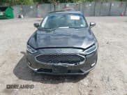 ✅ 2020 Ford Fusion Titanium • VIN: 3FA6P0D97LR116854 • Lot: 43081513. Listed on IAAI with 97,625 mi. Free auction sales archive from the USA and detailed vehicle history report at DreamBid. Image 12.