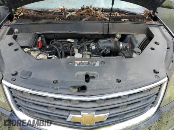 2015 Chevrolet Traverse LS z VIN 1GNKRFKD6FJ197476, wystawiony jako Copart lot #90977255 z przebiegiem 171 403 mil mil oraz Czysty tytuł • Clean title. Historia ofert i sprzedaży dostępna na DreamBid. Obrazek 11.