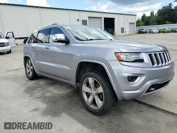 ✅ 2014 Jeep Grand Cherokee Overland • VIN: 1C4RJFCG5EC210163 • Lot: 68894775. Listed on Copart with 205,339 mi. Free auction sales archive from the USA and detailed vehicle history report at DreamBid. Image 13.