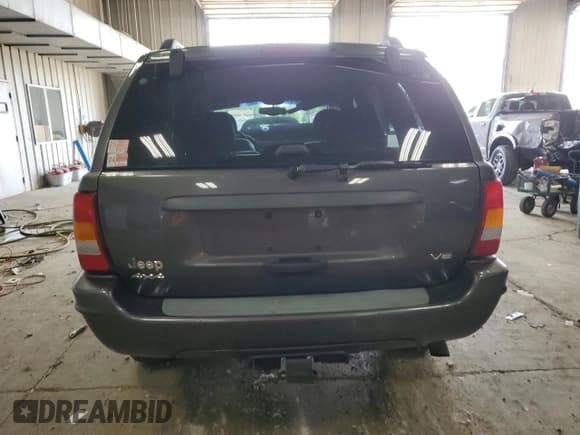 ✅ 2002 Jeep Grand Cherokee Laredo • VIN: 1J4GW48N92C321356 • Lot: 67315825. Listed on Copart with 112,829 mi. Free auction sales archive from the USA and detailed vehicle history report at DreamBid. Image 6.