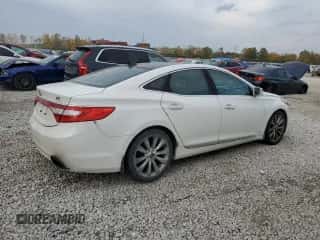 2012 Hyundai Azera z VIN KMHFH4JG4CA193222, wystawiony jako Copart lot #77207034 z przebiegiem 150 634 mil mil oraz Szkoda całkowita • Salvage title. Historia ofert i sprzedaży dostępna na DreamBid. Obrazek 3.