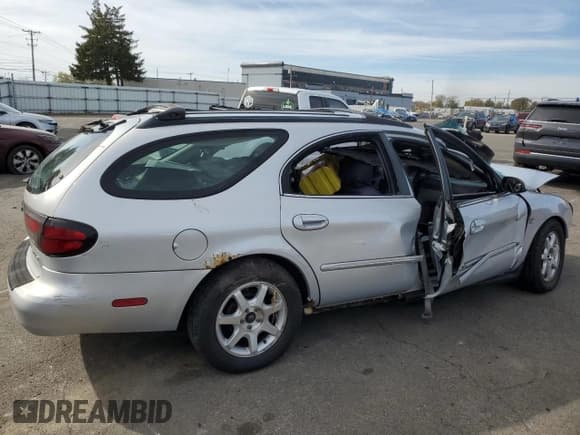 ✅ 2002 Mercury Sable LS Premium • VIN: 1MEHM59S12G607493 • Lot: 78230594. Listed on Copart with 127,913 mi. Free auction sales archive from the USA and detailed vehicle history report at DreamBid. Image 3.