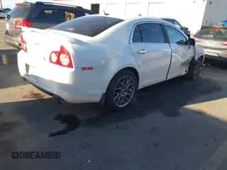 2009 Chevrolet Malibu LTZ with VIN 1G1ZK57749F131338, listed as a IAAI auction lot 43411871 with 135,544 mi miles and . Bid and sale history available at DreamBid. Image 4.