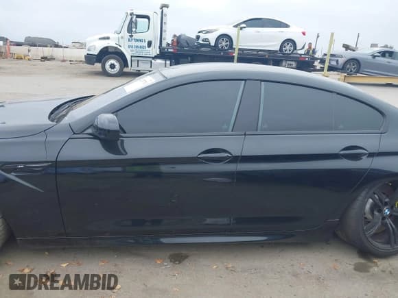 ✅ 2014 BMW M6 • VIN: WBS6C9C57ED467275 • Lot: 42787711. Listed on IAAI with 105,158 mi. Free auction sales archive from the USA and detailed vehicle history report at DreamBid. Image 14.