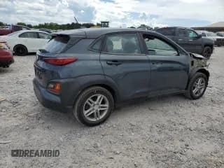 ✅ 2019 Hyundai Kona SE • VIN: KM8K12AA7KU221031 • Лот: 65231015. Опубликован ранее на Copart с пробегом 86 591 миль. Бесплатный доступ к архиву аукционных продаж из США и подробный отчёт об истории автомобиля на DreamBid. Изображение 3.