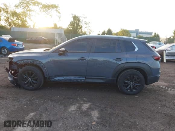 ✅ 2024 Mazda CX-50 S Select • VIN: 7MMVABAM4RN164044 • Lot: 43440389. Listed on IAAI with 26,914 mi. Free auction sales archive from the USA and detailed vehicle history report at DreamBid. Image 14.