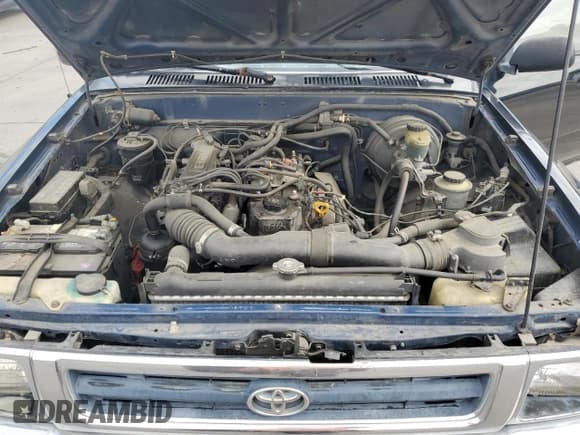 ✅ 1994 Toyota Pickup DX • VIN: 4TARN01P3RZ201366 • Лот: 71034454. Опубликован ранее на Copart с пробегом 194 401 миль. Бесплатный доступ к архиву аукционных продаж из США и подробный отчёт об истории автомобиля на DreamBid. Изображение 11.