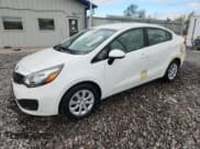✅ 2013 Kia Rio LX • VIN: KNADM4A39D6241206 • Lot: 69783215. Listed on Copart with 73,107 mi. Free auction sales archive from the USA and detailed vehicle history report at DreamBid. Image 1.