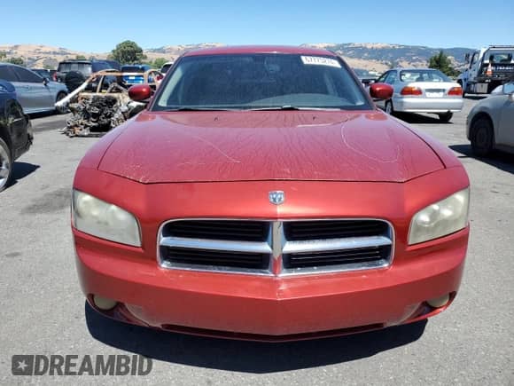 2006 Dodge Charger R/T с VIN 2B3LA53H76H480794, выставлен на аукционе Copart как лот 67775274 с пробегом 186 786 миль миль и Списание • Salvage title. История ставок и продаж доступна на DreamBid. Изображение 5.