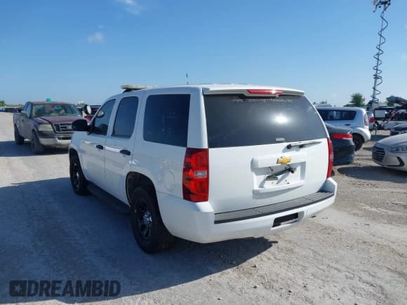 ✅ 2014 Chevrolet Tahoe Commercial • VIN: 1GNLC2E06ER193189 • Lot: 42672382. Listed on IAAI with 78,402 mi. Free auction sales archive from the USA and detailed vehicle history report at DreamBid. Image 3.