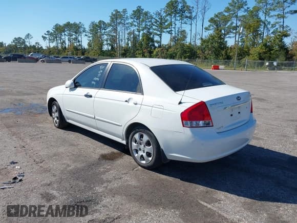 ✅ 2009 Kia Spectra EX • VIN: KNAFE221295656744 • Lot: 43283836. Listed on IAAI with 213,956 mi. Free auction sales archive from the USA and detailed vehicle history report at DreamBid. Image 3.