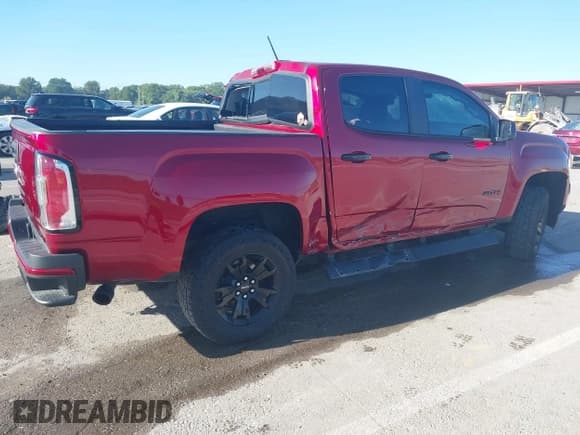 ✅ 2021 GMC Canyon 4WD AT4 • VIN: 1GTG6FEN1M1295470 • Lot: 43071098. Listed on IAAI with 84,517 mi. Free auction sales archive from the USA and detailed vehicle history report at DreamBid. Image 4.