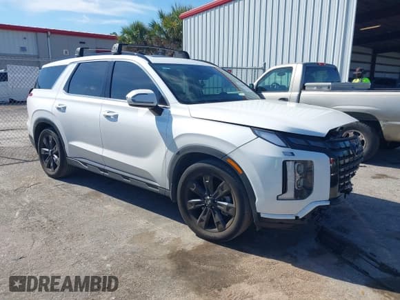 ✅ 2023 Hyundai Palisade XRT • VIN: KM8R34GE8PU560774 • Лот: 41463864. Опубликован ранее на IAAI с пробегом 52 783 миль. Бесплатный доступ к архиву аукционных продаж из США и подробный отчёт об истории автомобиля на DreamBid. Изображение 1.