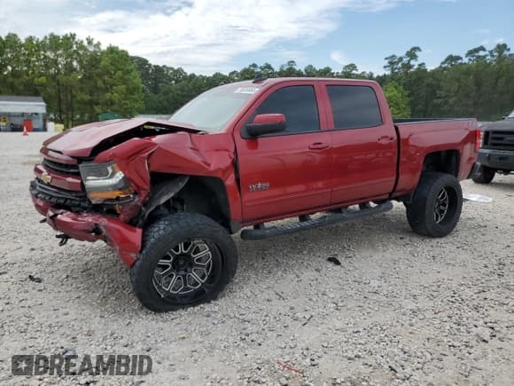 ✅ 2018 Chevrolet Silverado 1500 LT • VIN: 3GCUKREC4JG179403 • Лот: 70026954. Опубликован ранее на Copart с пробегом 96 670 миль. Бесплатный доступ к архиву аукционных продаж из США и подробный отчёт об истории автомобиля на DreamBid. Изображение 1.