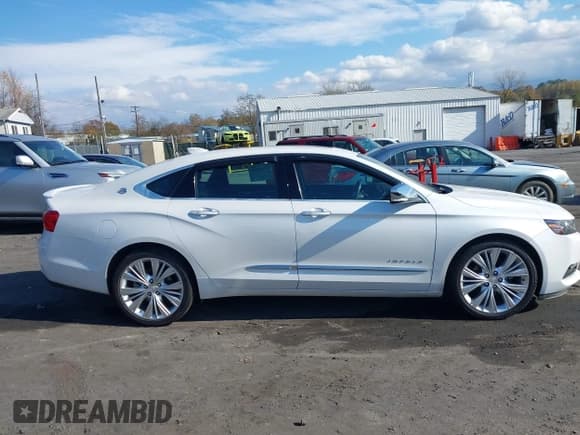 ✅ 2015 Chevrolet Impala LTZ • VIN: 1G1165S30FU129521 • Lot: 43510848. Listed on IAAI with 86,284 mi. Free auction sales archive from the USA and detailed vehicle history report at DreamBid. Image 13.