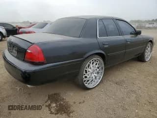 ✅ 2003 Mercury Marauder • VIN: 2MEHM75V73X636648 • Лот: 61054815. Опубликован ранее на Copart с пробегом 123 119 миль. Бесплатный доступ к архиву аукционных продаж из США и подробный отчёт об истории автомобиля на DreamBid. Изображение 3.