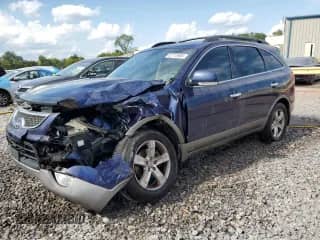 2010 Hyundai Veracruz Limited z VIN KM8NU4CC1AU136862, wystawiony jako Copart lot #67715985 z przebiegiem Nie podano mil oraz Szkoda całkowita • Salvage title. Historia ofert i sprzedaży dostępna na DreamBid. Obrazek 1.