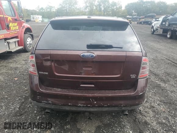 ✅ 2009 Ford Edge SEL • VIN: 2FMDK48C69BA34498 • Lot: 85580205. Wystawiony na Copart z przebiegiem 233 106 mil. Bezpłatny archiwum sprzedaży aukcyjnych z USA i szczegółowy raport historii pojazdu na DreamBid. Zdjęcie 6.