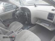 ✅ 2001 Hyundai Elantra GLS • VIN: KMHDN45D71U080537 • Lot: 42095959. Wystawiony na IAAI z przebiegiem Nie podano. Bezpłatny archiwum sprzedaży aukcyjnych z USA i szczegółowy raport historii pojazdu na DreamBid. Zdjęcie 5.