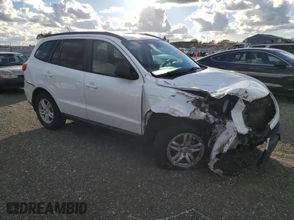 ✅ 2012 Hyundai Santa Fe GLS • VIN: 5XYZGDAB7CG100024 • Lot: 81995244. Listed on Copart with Not provided. Free auction sales archive from the USA and detailed vehicle history report at DreamBid. Image 4.