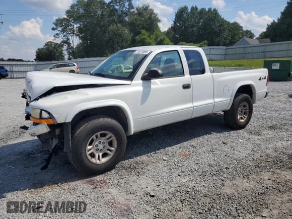 ✅ 2004 Dodge Dakota SLT • VIN: 1D7HG42N34S685318 • Lot: 71077095. Listed on Copart with 163,925 mi. Free auction sales archive from the USA and detailed vehicle history report at DreamBid. Image 1.
