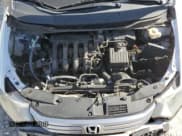 ✅ 2010 Honda Insight EX • VIN: JHMZE2H77AS035113 • Lot: 54179005. Listed on Copart with 165,083 mi. Free auction sales archive from the USA and detailed vehicle history report at DreamBid. Image 11.