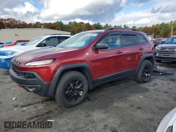 ✅ 2015 Jeep Cherokee Trailhawk • VIN: 1C4PJMBS7FW785740 • Lot: 89643045. Listed on Copart with 199,831 mi. Free auction sales archive from the USA and detailed vehicle history report at DreamBid. Image 1.