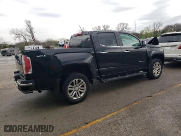 ✅ 2015 GMC Canyon 4WD SLT • VIN: 1GTG6CE36F1207707 • Lot: 51512175. Listed on Copart with 49,668 mi. Free auction sales archive from the USA and detailed vehicle history report at DreamBid. Image 3.