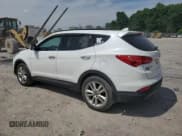 ✅ 2016 Hyundai Santa Fe • VIN: 5XYZWDLA5GG318718 • Лот: 59005404. Опубликован ранее на Copart с пробегом 126 700 миль. Бесплатный доступ к архиву аукционных продаж из США и подробный отчёт об истории автомобиля на DreamBid. Изображение 2.