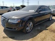 ✅ 2015 Audi A8 3.0L TDI • VIN: WAU3MAFD2FN006795 • Lot: 51791283. Listed on Copart with 106,415 mi. Free auction sales archive from the USA and detailed vehicle history report at DreamBid. Image 1.