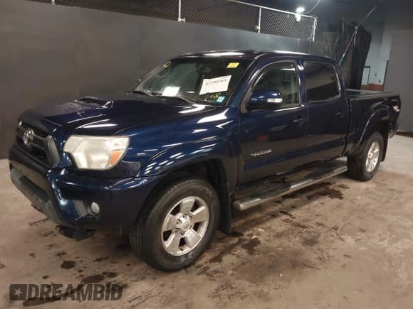 ✅ 2013 Toyota Tacoma • VIN: 3TMMU4FNXDM050214 • Lot: 42295765. Listed on IAAI with 157,014 mi. Free auction sales archive from the USA and detailed vehicle history report at DreamBid. Image 17.