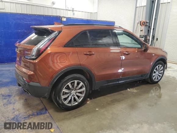 ✅ 2020 Cadillac XT4 AWD Sport • VIN: 1GYFZFR46LF137559 • Лот: 89524685. Опубликован ранее на Copart с пробегом 64 208 миль. Бесплатный доступ к архиву аукционных продаж из США и подробный отчёт об истории автомобиля на DreamBid. Изображение 3.