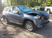✅ 2015 Mazda CX-5 Sport • VIN: JM3KE2BE6F0465171 • Lot: 43269690. Wystawiony na IAAI z przebiegiem 197 268 mil. Bezpłatny archiwum sprzedaży aukcyjnych z USA i szczegółowy raport historii pojazdu na DreamBid. Zdjęcie 1.