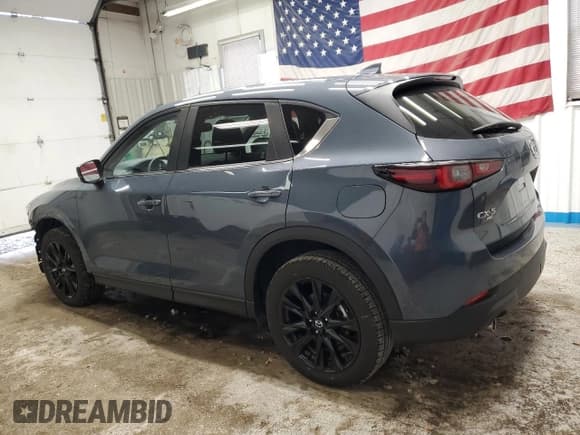 ✅ 2025 Mazda CX-5 S Carbon Edition • VIN: JM3KFBCM1S0692426 • Лот: 90807895. Опубликован ранее на Copart с пробегом 5 954 миль. Бесплатный доступ к архиву аукционных продаж из США и подробный отчёт об истории автомобиля на DreamBid. Изображение 2.