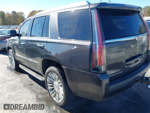 ✅ 2016 Cadillac Escalade Platinum • VIN: 1GYS4DKJ5GR119009 • Lot: 43718664. Listed on IAAI with 152,993 mi. Free auction sales archive from the USA and detailed vehicle history report at DreamBid. Image 3.