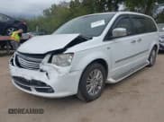 ✅ 2014 Chrysler Town & Country Touring L • VIN: 2C4RC1CG0ER239526 • Lot: 43384005. Listed on IAAI with 128,813 mi. Free auction sales archive from the USA and detailed vehicle history report at DreamBid. Image 6.