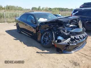 2023 Dodge Charger Scat Pack with VIN 2C3CDXGJ3PH506439, listed as a IAAI auction lot 43205260 with 20,423 mi miles and . Bid and sale history available at DreamBid. Image 1.