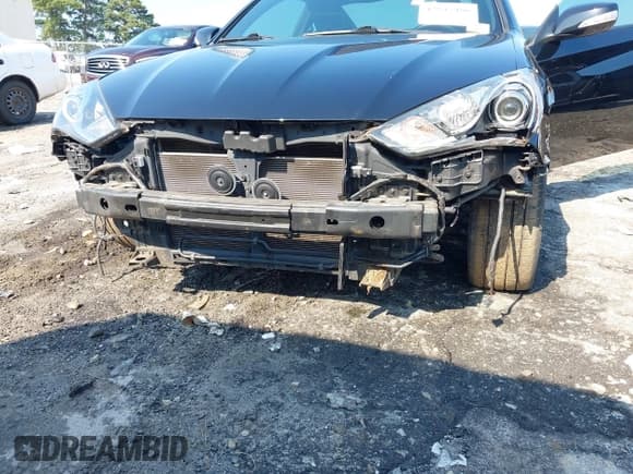 ✅ 2013 Hyundai Genesis Coupe Grand Touring • VIN: KMHHU6KJ1DU093704 • Lot: 42945486. Wystawiony na IAAI z przebiegiem 77 781 mil. Bezpłatny archiwum sprzedaży aukcyjnych z USA i szczegółowy raport historii pojazdu na DreamBid. Zdjęcie 6.