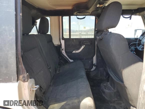 ✅ 2012 Jeep Wrangler Unlimited Call of Duty MW3 • VIN: 1C4BJWFG1CL108837 • Lot: 69850295. Listed on Copart with 123,224 mi. Free auction sales archive from the USA and detailed vehicle history report at DreamBid. Image 10.