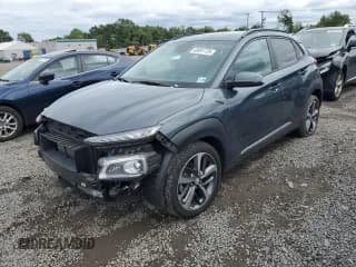 ✅ 2021 Hyundai Kona Limited • VIN: KM8K3CA58MU696161 • Лот: 69591725. Опубликован ранее на Copart с пробегом 58 787 миль. Бесплатный доступ к архиву аукционных продаж из США и подробный отчёт об истории автомобиля на DreamBid. Изображение 1.