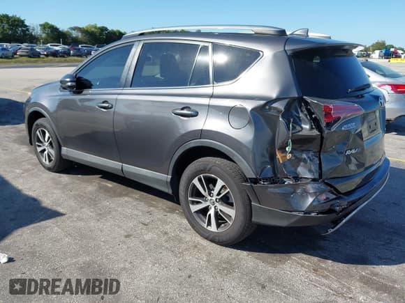 ✅ 2018 Toyota RAV4 XLE • VIN: 2T3WFREVXJW412618 • Lot: 43696429. Listed on IAAI with 134,394 mi. Free auction sales archive from the USA and detailed vehicle history report at DreamBid. Image 3.