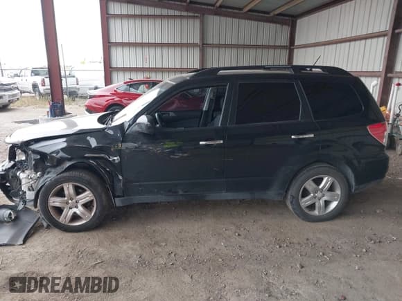 ✅ 2009 Subaru Forester X • VIN: JF2SH63619H745053 • Лот: 43083995. Опубликован ранее на IAAI с пробегом 150 633 миль. Бесплатный доступ к архиву аукционных продаж из США и подробный отчёт об истории автомобиля на DreamBid. Изображение 14.
