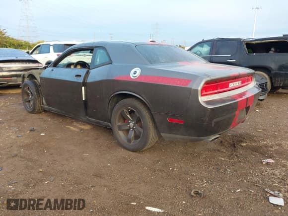 ✅ 2013 Dodge Challenger SXT • VIN: 2C3CDYAG0DH665966 • Lot: 43543054. Listed on IAAI with 128,859 mi. Free auction sales archive from the USA and detailed vehicle history report at DreamBid. Image 3.