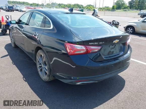 2020 Chevrolet Malibu Premier with VIN 1G1ZE5SX1LF022454, listed as a IAAI auction lot 42618319 with 77,639 mi miles and . Bid and sale history available at DreamBid. Image 3.