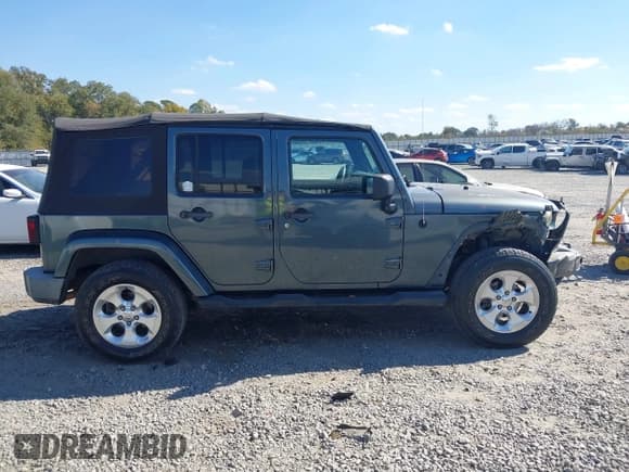 ✅ 2007 Jeep Wrangler Unlimited Sahara • VIN: 1J4GA59167L215437 • Лот: 43642429. Опубликован ранее на IAAI с пробегом 185 481 миль. Бесплатный доступ к архиву аукционных продаж из США и подробный отчёт об истории автомобиля на DreamBid. Изображение 13.