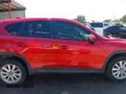 ✅ 2015 Mazda CX-5 Touring • VIN: JM3KE2CY2F0510101 • Lot: 43273950. Listed on IAAI with 128,283 mi. Free auction sales archive from the USA and detailed vehicle history report at DreamBid. Image 13.